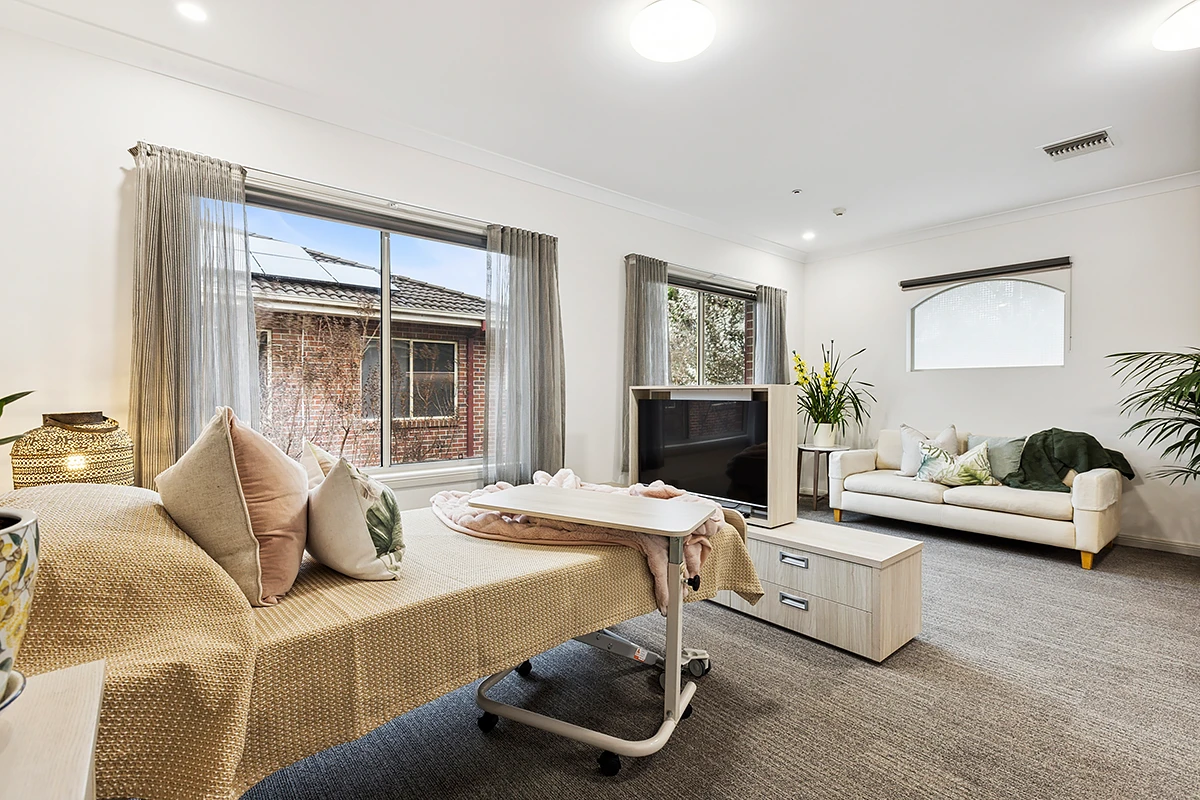 A large, private aged care room at BASSCARE Faversham House, a premier residential aged care facility in Canterbury, Melbourne.